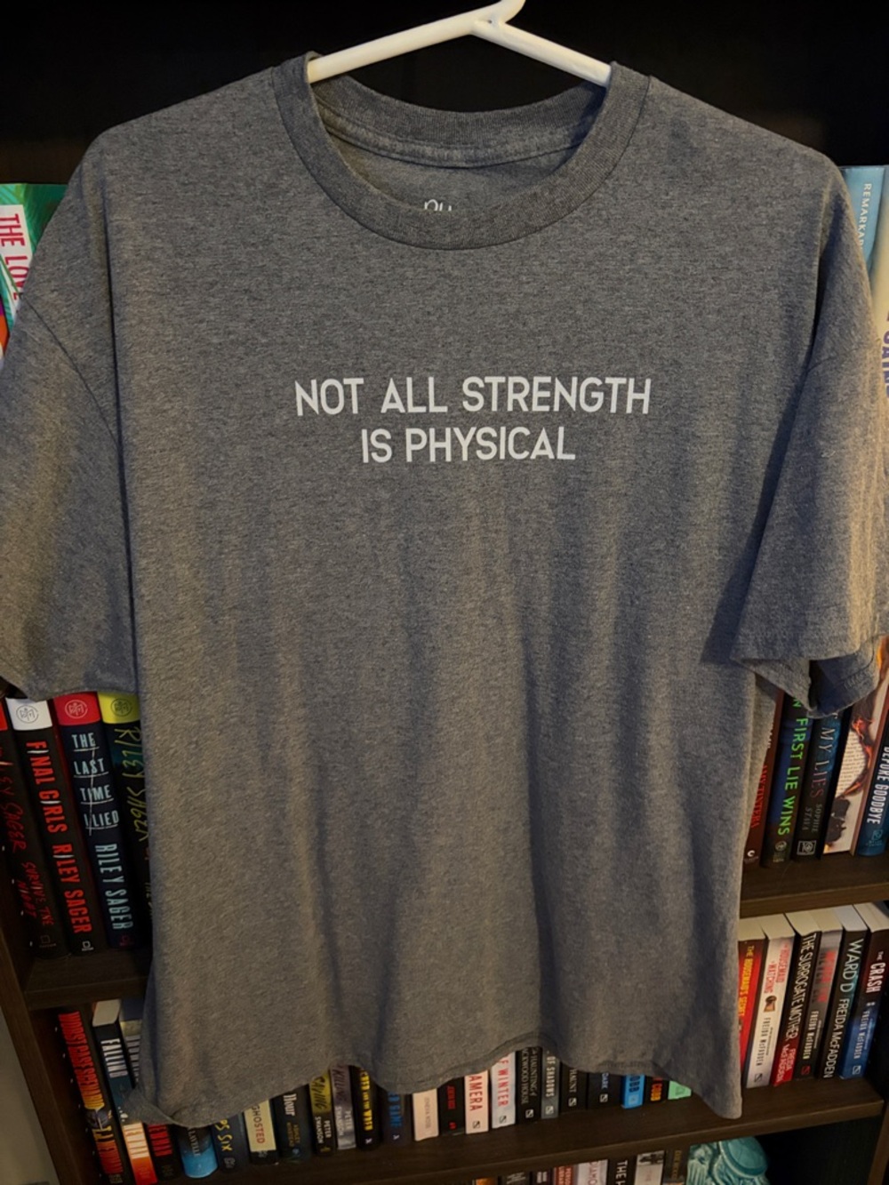 Women's Gray Graphic Tee - Not All Strength Is Physical